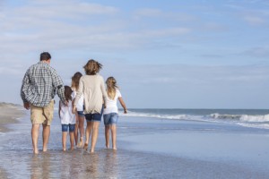 Family Parents Girl Children Walking on Beach